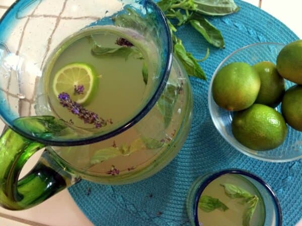 Ginger basil limeade with lavender garnish. (Courtesy of Kami McBride)