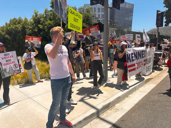 One campaign volunteer called the Kennedy exclusion "an insult to democracy." Above, supporters rally in Burbank, Calif., on June 21, 2024. (Jill McLaughlin/The Epoch Times)