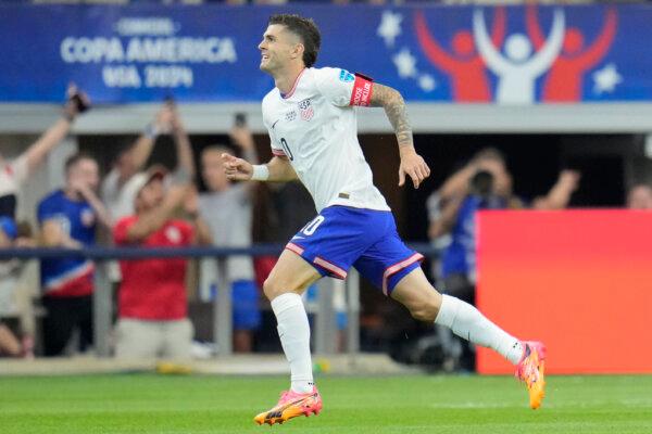 Christian Pulisic of the United States celebrates after scoring against Bolivia during a Copa America soccer match in Arlington, Texas, on June 23, 2024. (Julio Cortez/AP Photo)