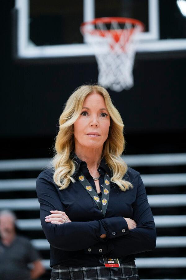 Lakers owner Jeanie Buss listens to the team's new coach, JJ Redick, speak in El Segundo, Calif., on June 24, 2024. (Damian Dovarganes/AP Photo)