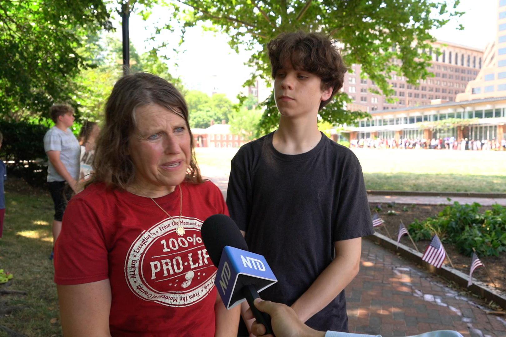 A registered nurse, Jean Fischer, attended the 4th Annual March for Life and Rally with her son at Independence Mall in Philadelphia, Pa., on June 22, 2024. (William Huang/The Epoch Times)