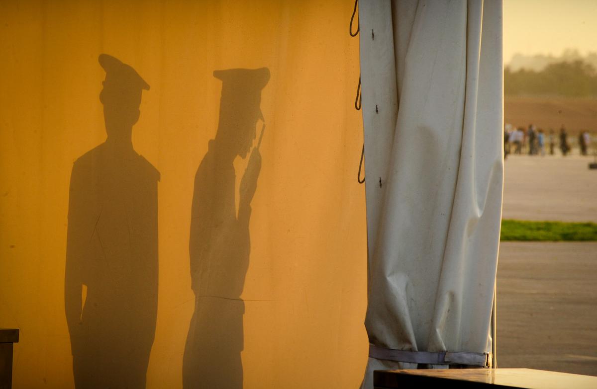 Silhouettes of Chinese paramilitary policemen guarding an entrance to Tiananmen Square in Beijing on June 4, 2009. (Peter Parks/AFP via Getty Images)