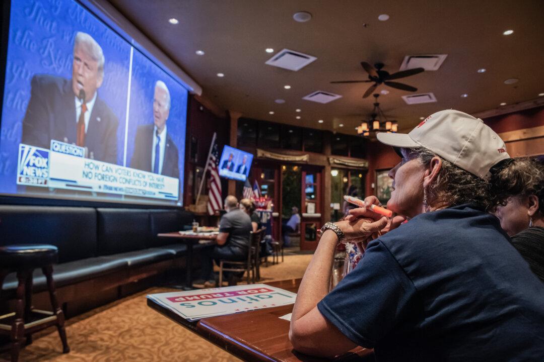 Rhonda Marquardt watches the final presidential debate between President Donald Trump and former Vice President Joe Biden in San Antonio on Oct. 22, 2020. (Sergio Flores/Getty Images)