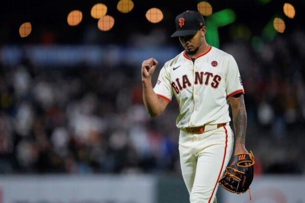 Giants reliever Camilo Doval gives a fist pump after closing out a 4-3 victory over the Cubs in San Francisco on June 26, 2024. (Godofredo A. Vásquez/AP Photo)