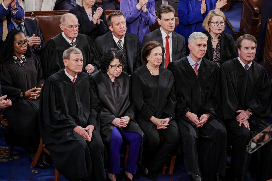 (L–R) Supreme Court Justice Ketanji Brown Jackson, retired Justice Anthony Kennedy, Chief Justice John Roberts, Justice Sonia Sotomayor, Justice Elena Kagan, Justice Neil Gorsuch and Justice Brett Kavanaugh attend President Joe Biden's State of the Union address at the U.S. Capitol on March 7, 2024. (Alex Wong/Getty Images)