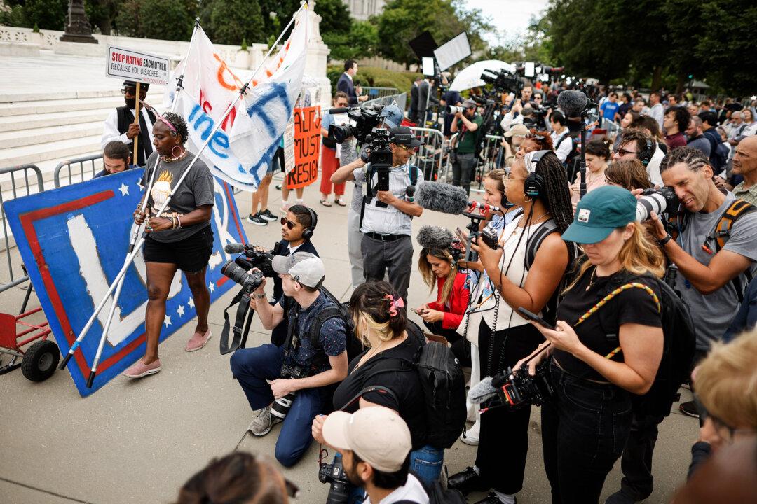 Demonstrators and protesters gather with members of the news media in front of the Supreme Court to wait for it to announce its last decisions for this session in Washington on July 1, 2024. (Chip Somodevilla/Getty Images)