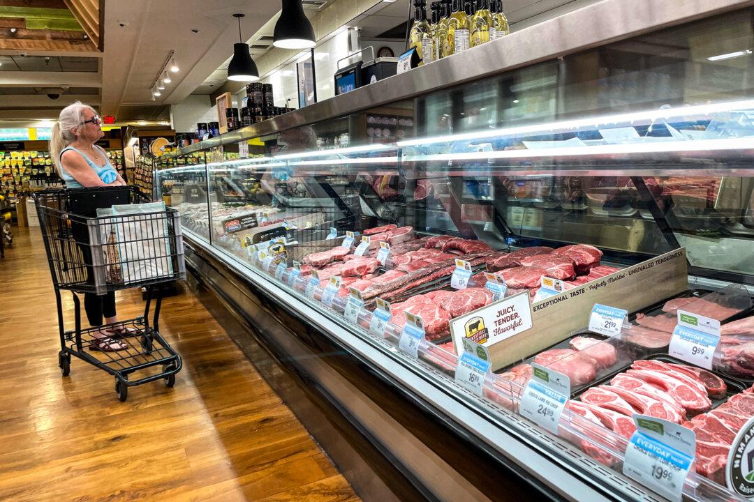 A customer shops for meat at an Andronico's supermarket in San Anselmo, Calif., on June 8, 2022. (Justin Sullivan/Getty Images)