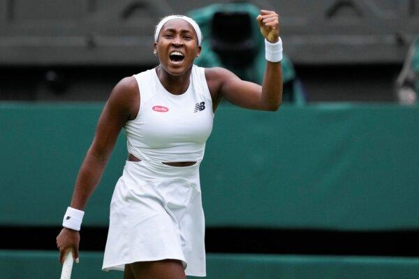 Coco Gauff reacts after winning a point against Caroline Dolehide during a first-round Wimbledon match in London on July 1, 2024. (Alberto Pezzali/AP Photo)