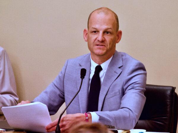 Assemblyman Kevin McCarty, chair of the Assembly's Public Safety Committee, makes a motion to amend Senate Bill 1414 during the committee hearing at the Capitol in Sacramento on July 2, 2024. (Travis Gillmore/The Epoch Times)