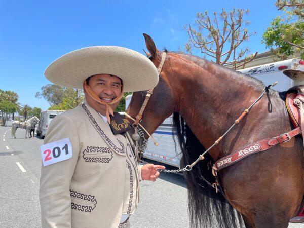 Horse dance rider Raúl Maldonado, also the superintendent of Palmdale School District, and his horse Whiskey participate in the Independence Day Parade in Huntington Beach, Calif., on July 4, 2024. (Sophie Li/The Epoch Times)