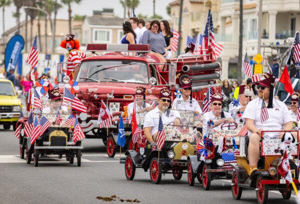 Shriners from the El Bekal Shrine in Anaheim participate in the Independence Day parade in Huntington Beach, Calif., on July 4, 2024. (John Fredricks/The Epoch Times)