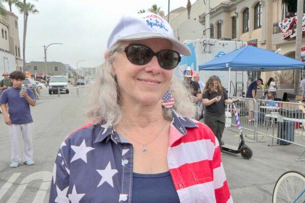 Lorraine Ross, a Huntington Beach resident for 37 years, celebrates Independence Day in Huntington Beach, Calif., on July 4, 2024. (NTD Television/Screenshot by The Epoch Times)