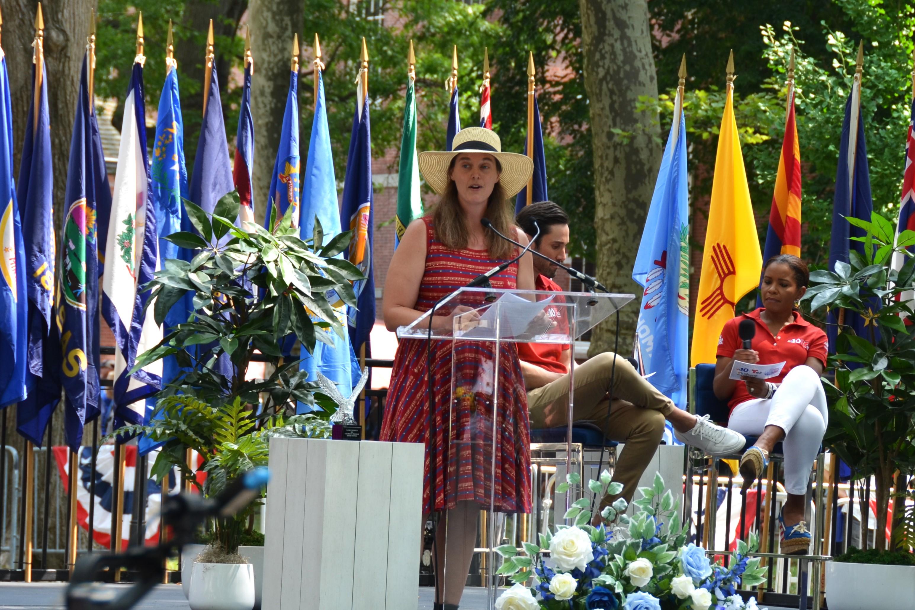 Naomi Connelly, the Celebrate Freedom Award grand prize winner, speaks at the Celebration of Freedom Ceremony on July 4, 2024. (Frank Liang/The Epoch Times)