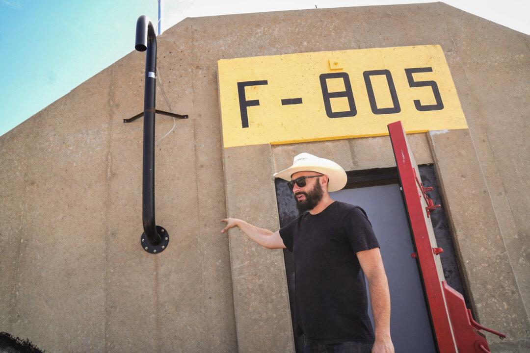 Dante Vicino, executive director and operations manager of Vivos xPoint, located on a former military base near Edgemont, S.D., points out some of the unique features of his personal bunker home. The Vivos Group, which owns 575 bunkers, plans to convert them all into liveable homes. (Allan Stein/The Epoch Times)