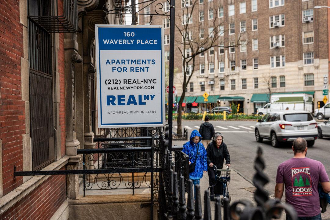 A sign advertising units for rent is displayed outside a building in New York City on April 11, 2024. (Spencer Platt/Getty Images)