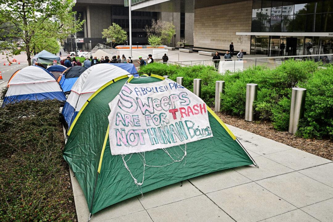 Tents of homeless people line the street in front of a federal building in Los Angeles on April 22, 2024. (Frederic J. Brown/AFP via Getty Images)