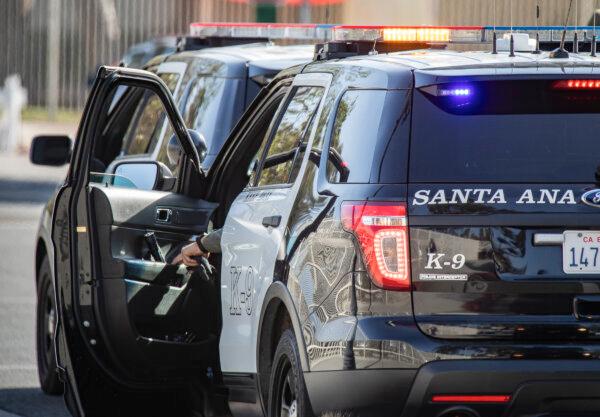 A police officer responds to an incident in Santa Ana, Calif., on March 10, 2022.  (John Fredricks/The Epoch Times)