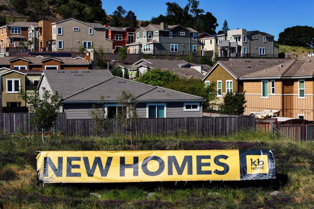 A sign is on display next to an area of the KB Home development in Petaluma, Calif., on May 2, 2024. Many first-time homebuyers are waiting for prices or mortgage rates to fall. (Justin Sullivan/Getty Images)