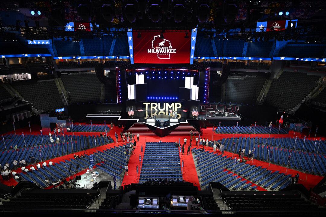 Workers prepare the stage for the Republican National Convention (RNC) at the Fiserv Forum in Milwaukee on July 13, 2024. The RNC will be held in Milwaukee from July 15–18. (Leon Neal/Getty Images)