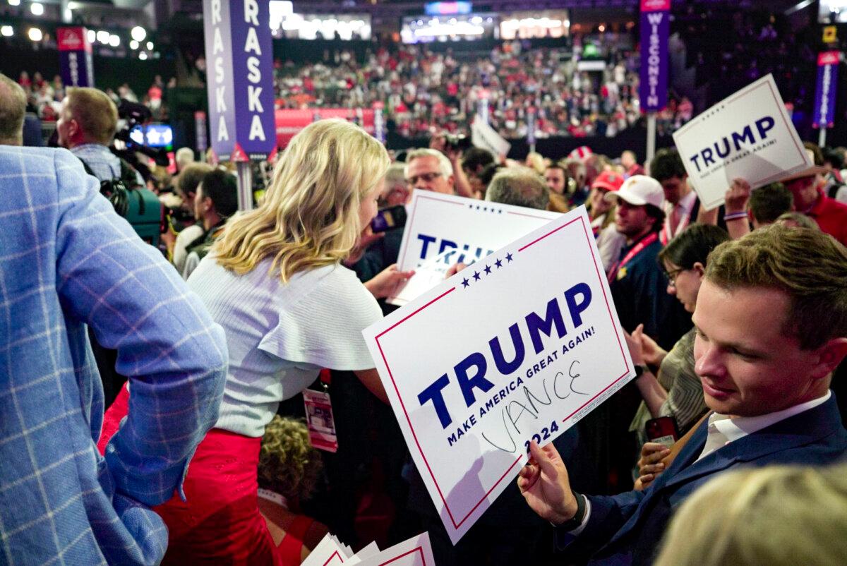 Delegates at the 2024 Republican National Convention wait for J.D. Vance to arrive after being picked as former President and Republican candidate Donald J. Trump's running mate in Milwaukee on July 15, 2024. (Madalina Vasiliu/The Epoch Times)