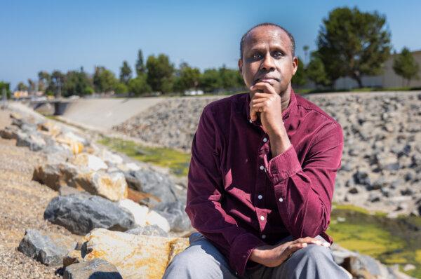 "I was extremely confused," said Joseph Mohamad, referring to when a Muslim friend drove him to a Christian church's parking lot. Above, Mr. Mohamad in Irvine, Calif., on July 8, 2024. (John Fredricks/The Epoch Times)