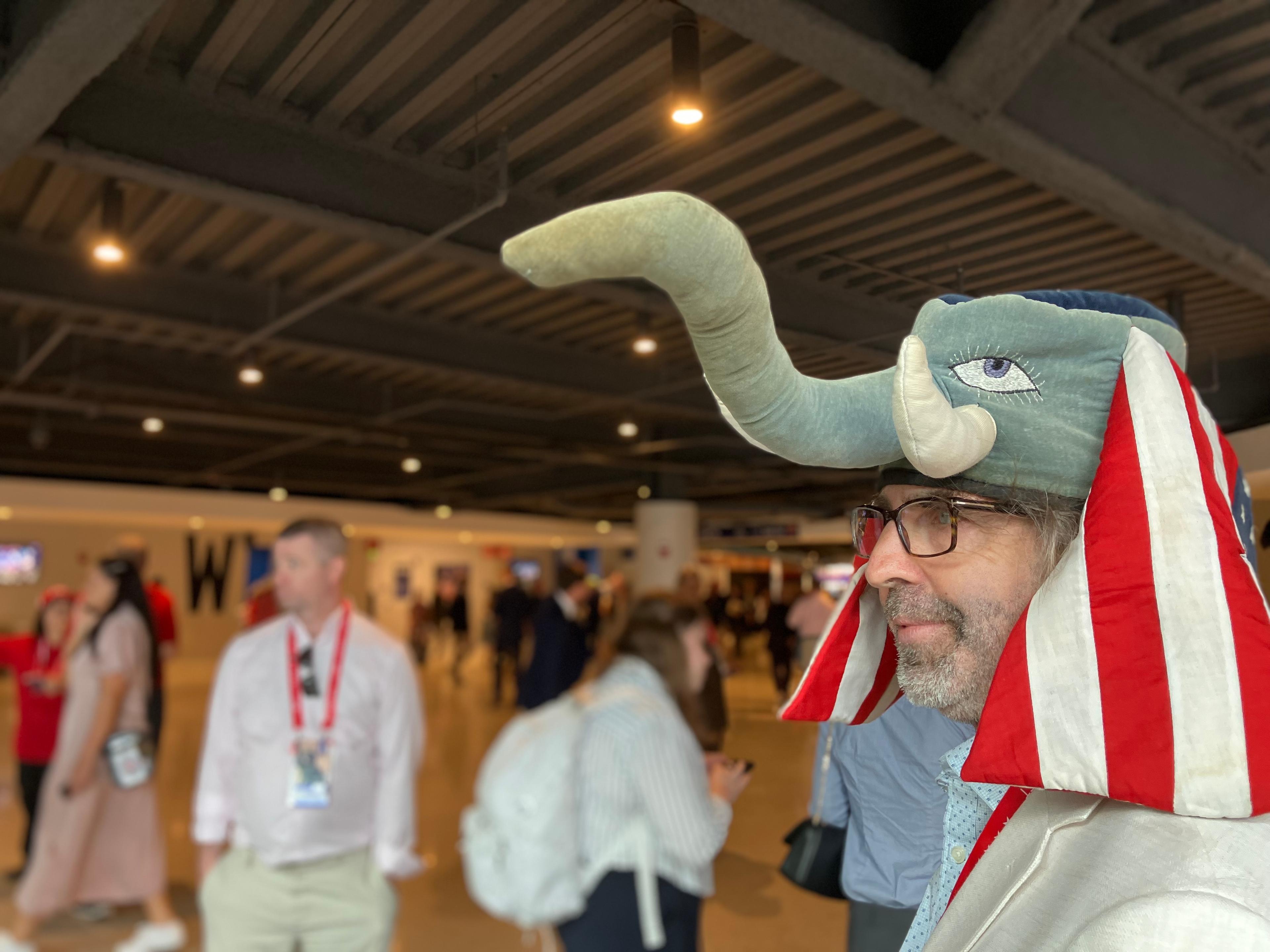 Conventioneer Jim Walsh of Connecticut sports headgear depicting the GOP mascot, an elephant, at the Fiserv Forum, the site of the Republican National Convention in Milwaukee, Wisc., on July 15, 2024. (Janice Hisle/The Epoch Times)