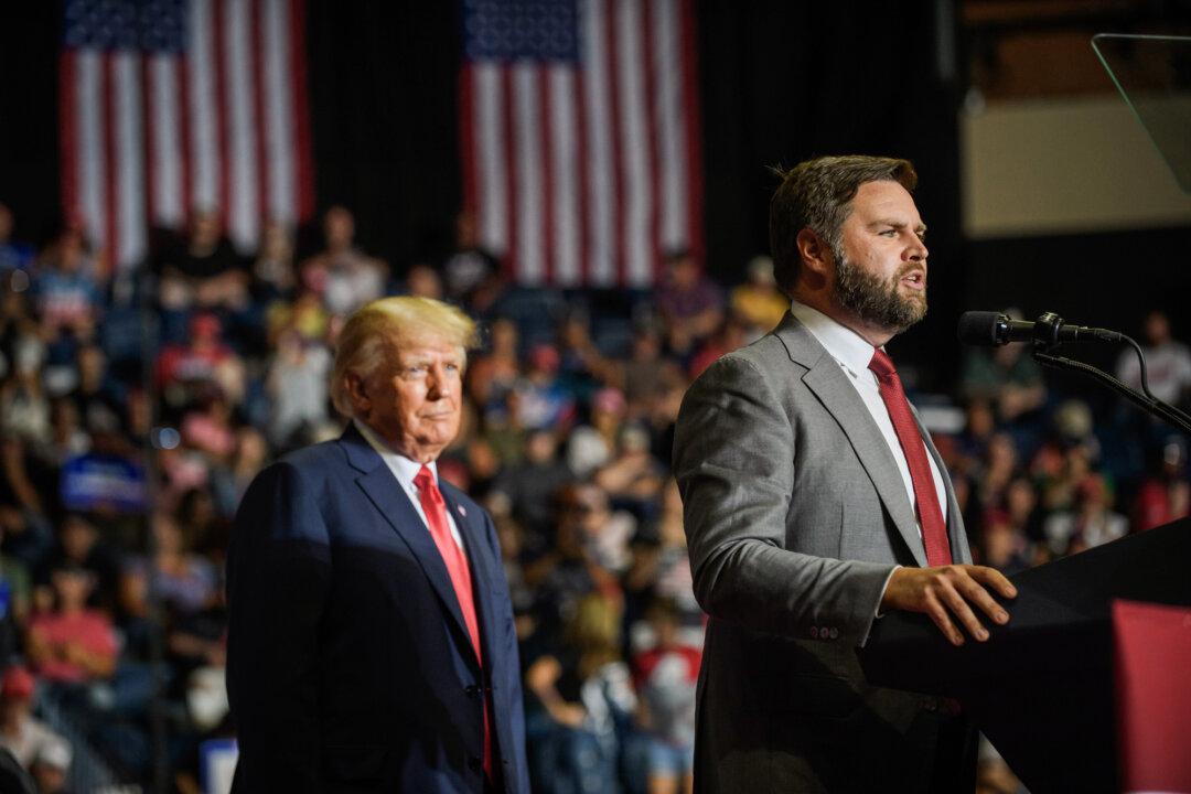 Republican U.S. Senate candidate J.D. Vance and former President Donald Trump speak at a Save America Rally to support Republican candidates running for state and federal offices in Ohio, at the Covelli Centre in Youngstown, Ohio, on Sept. 17, 2022. (Jeff Swensen/Getty Images)