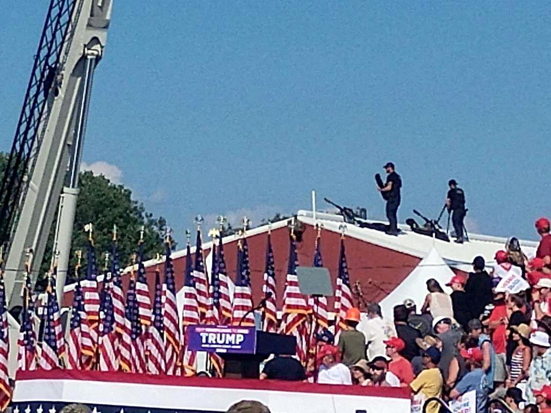 Snipers stand on a roof at Republican presidential candidate and former President Donald Trump's campaign rally in Butler, Pa., on July 13, 2024. (Glen Van Tryfle/TMX via Reuters)