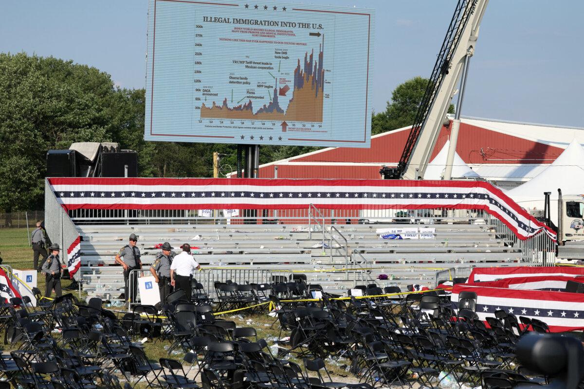 Security personnel inspect the site after gunfire rang out during a campaign rally at the Butler Farm Show in Butler, Pa., on July 13, 2024. (Brendan McDermid/Reuters)