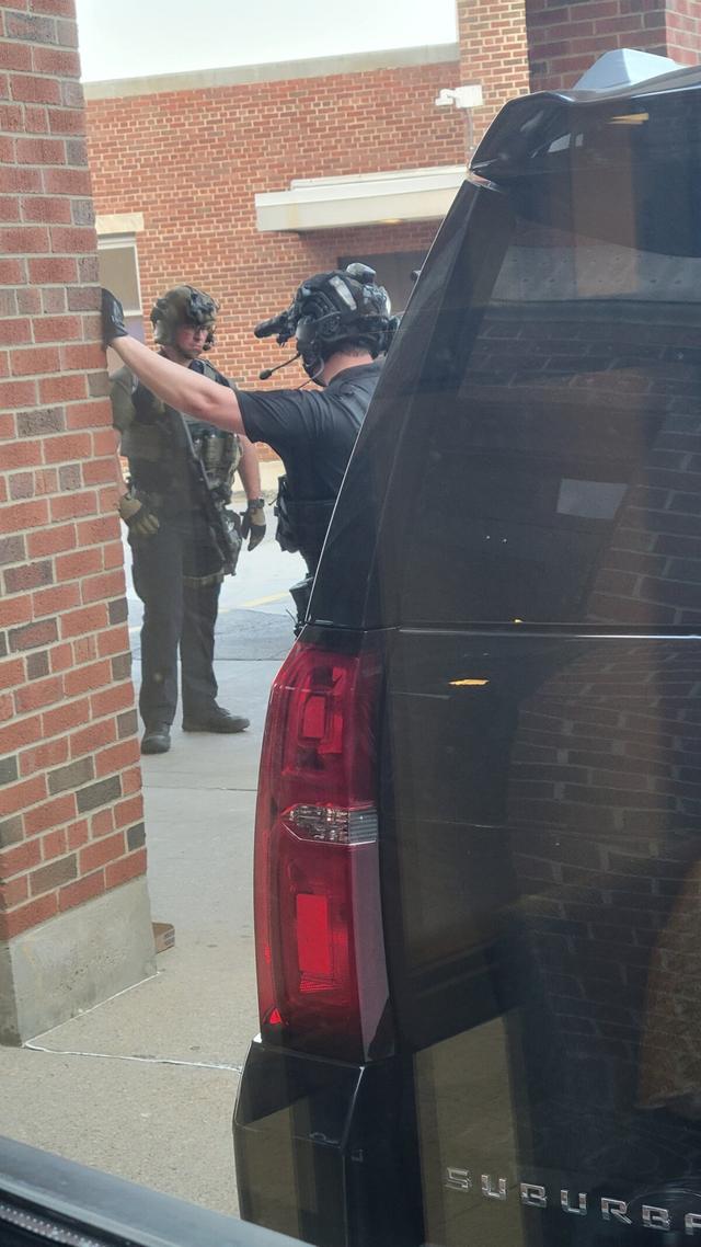 Security detail guarding the door when former President Donald Trump arrived at the Butler Memorial Hospital in Butler, Pa., seen from the emergency room waiting area, on July 13, 2024. (Courtesy of Rick Foerster)