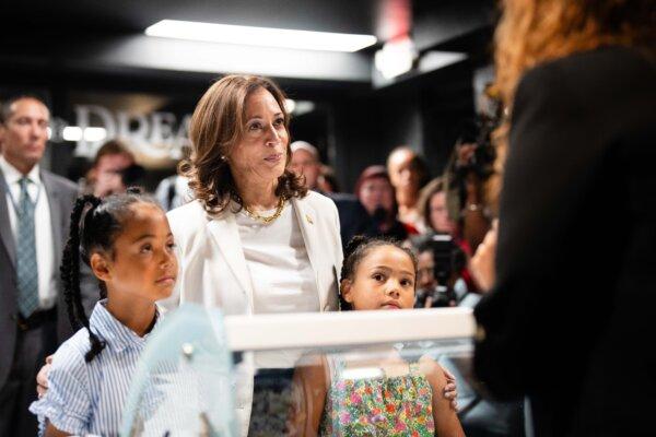 Vice President Kamala Harris orders ice cream with her nieces from Tyra Banks at the opening of Banks' new pop-up ice cream shop, Smize & Dream, on July 19, 2024. (Erin Schaff - Pool/Getty Images)