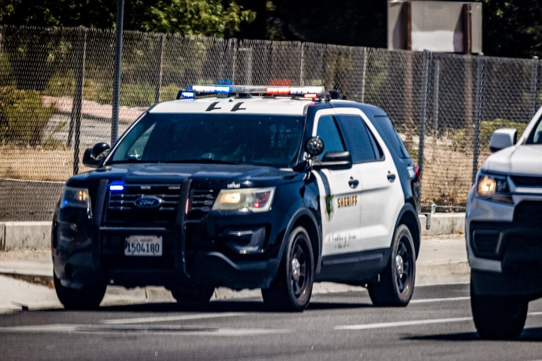 Los Angeles Sheriffs Department deputies work in Lancaster, Calif., on July 10, 2024. (John Fredricks/The Epoch Times)