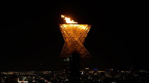 The Olympic cauldron is lit outside Rice-Eccles Stadium during celebrations of the election of Salt Lake City as the 2034 host of Olympic and Paralympic Winter Games in Salt Lake City, Utah on July 24, 2024. (Korey Martin/Getty Images)