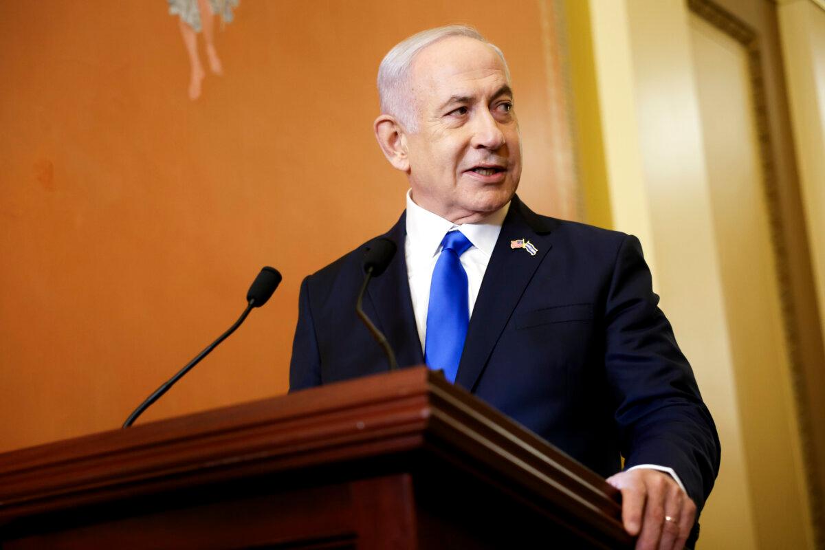 Israeli Prime Minister Benjamin Netanyahu speaks to reporters alongside Speaker of the House Mike Johnson (R-LA) at the U.S. Capitol Building in Washington, on July 24, 2024. (Anna Moneymaker/Getty Images)