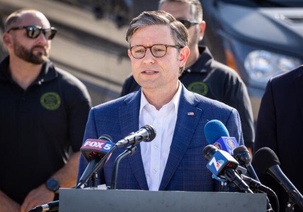 House Speaker Mike Johnson at the border wall in San Ysidro, Calif., on July 25, 2024. (John Fredricks/The Epoch Times)