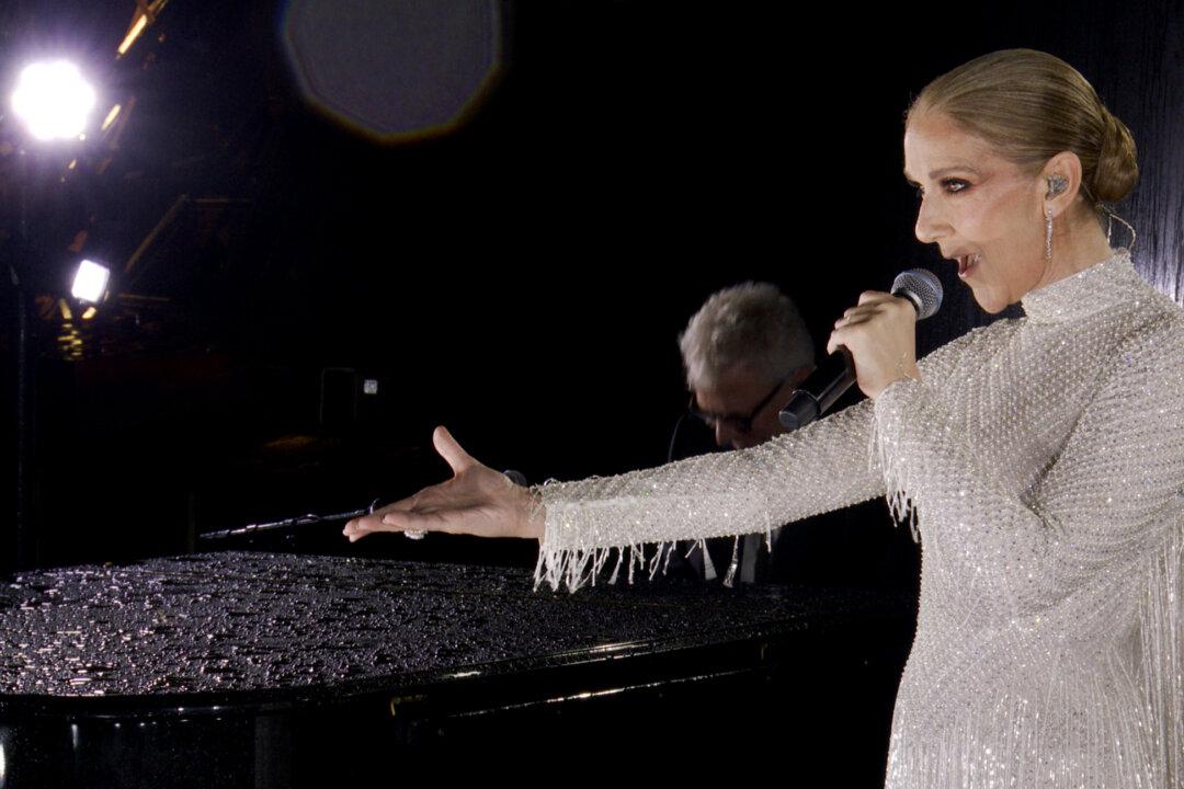 Singer Celine Dion performs on the Eiffel Tower during the opening ceremony of the Paris 2024 Olympic Games Paris 2024 in Paris, France, on July 26, 2024. (Screengrab by IOC via Getty Images)