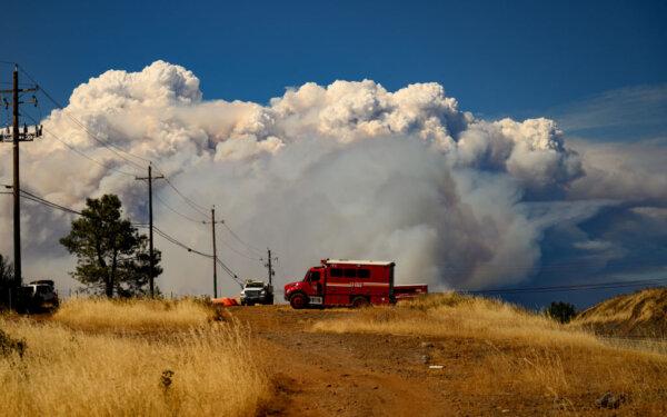 Smoke rises over the Forest Ranch area of Butte County as the Park Fire continues to burn near Chico, Calif., on July 26, 2024. (Josh Edelson/AFP via Getty Images)