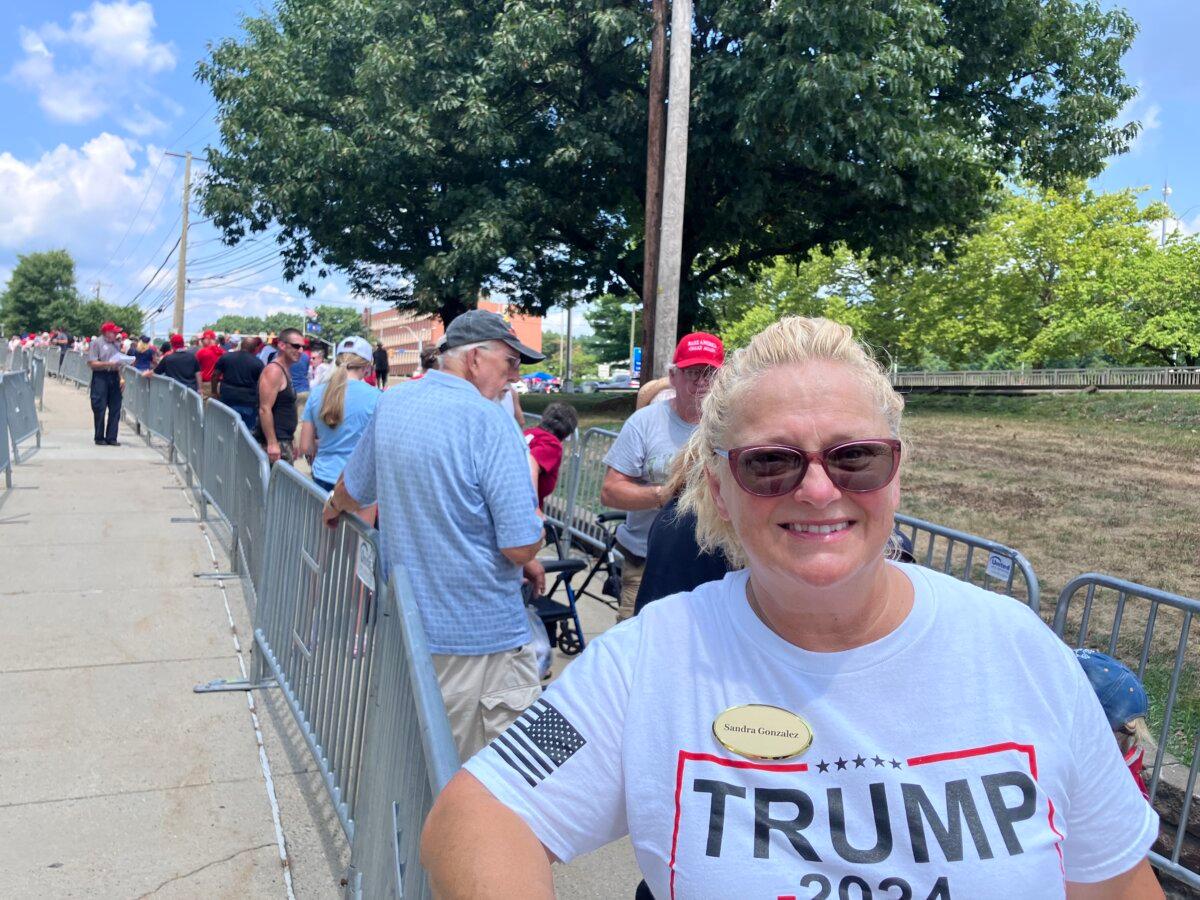 Sandra Gonzalez, 59, of York Haven, Pa., volunteers at a rally for former President Donald Trump outside New Holland Arena in Harrisburg, Pa., on July 31, 2024. (Janice Hisle/The Epoch Times)