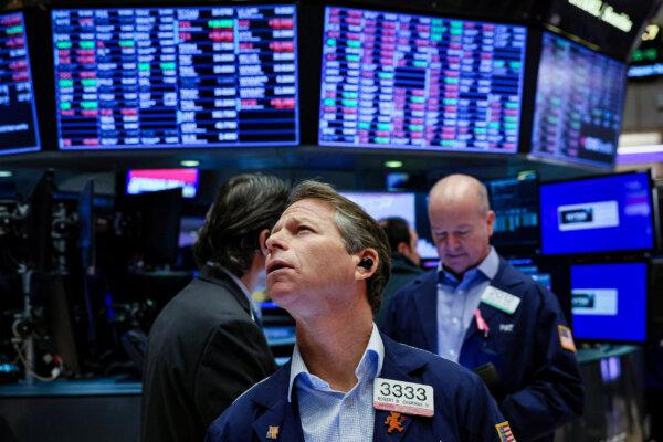 Traders work on the floor at the New York Stock Exchange (NYSE) in New York City, on Jan. 9, 2024. (Brendan McDermid/Reuters)