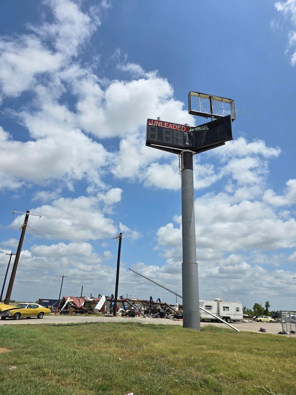 The destroyed Shell gas station sign near Interstate 35 in Valley View, Texas, on July 25, 2024. The building took a direct hit from an EF-3 tornado on May 25, 2024. (Allan Stein/The Epoch Times)