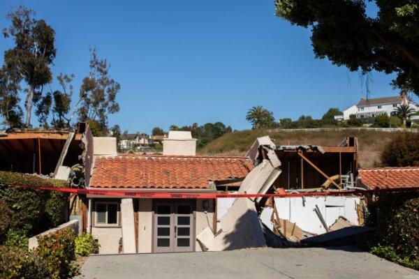 Collapsed homes after they slid down a hill in the Rolling Hills States neighborhood in Rancho Palos Verdes, Calif., on July 10, 2023. (Apu Gomes/AFP via Getty Images)