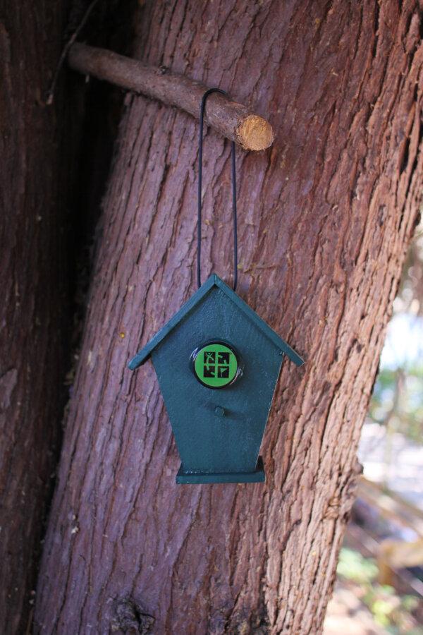 A birdhouse geocache. (Courtesy of Groundspeak Inc. (dba Geocaching))