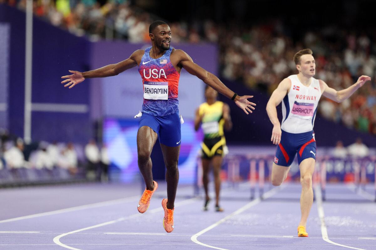 Rai Benjamin of Team United States celebrates winning the Gold medal competes during the men's 400m hurdles final on day 14 of the Olympic Games at Stade de France in Paris on Aug. 9, 2024. (Hannah Peters/Getty Images)