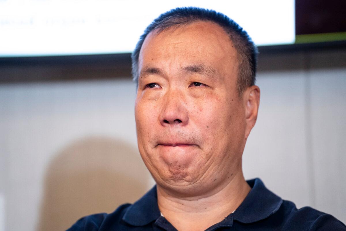 Cheng Peiming, a Falun Gong practitioner who had part of his liver and lung forcibly removed in China, at a news conference in Washington on Aug. 9, 2024. (Madalina Vasiliu/The Epoch Times)