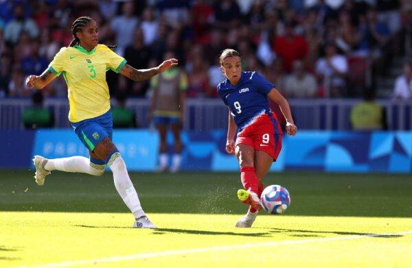 Mallory Swanson (9) of Team United States scores her team's winning goal during the Women's Gold Medal match between Brazil and United States of America during the 2024 Olympic Games in Paris on Aug. 10, 2024. (Robert Cianflone/Getty Images)