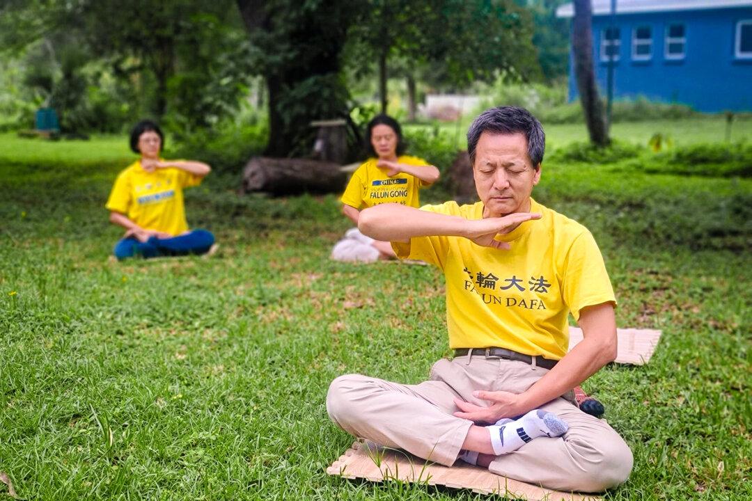 Florida-based marine scientist Sherwood Liu meditates in Largo, Fla., on Aug. 4, 2024. (Courtesy of Sherwood Liu)