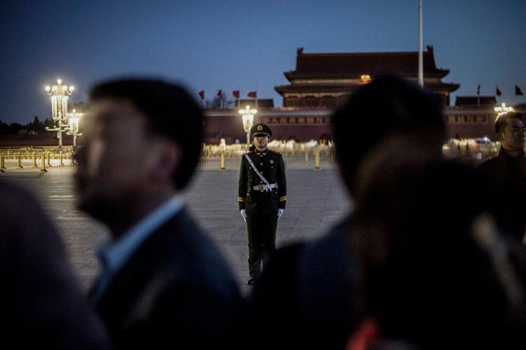 A paramilitary police officer stands on Tiananmen Square in Beijing on March 15, 2019. (Fred Dufour/AFP via Getty Images)