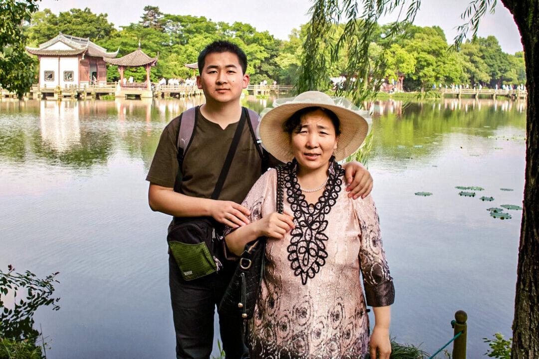 Simon Zhang and his mother, Ji Yunzhi, pose for a photo during a trip to Hangzhou, Zhejiang Province, China, in 2012. (Courtesy of Simon Zhang)