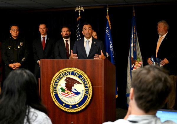 Martin Estrada, U.S. Attorney for the Central District of California, speaks at a Los Angeles press conference on Aug. 15. (Patrick T. Fallon/AFP via Getty Images)