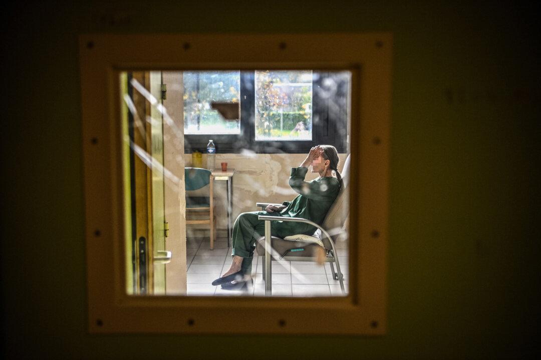 A patient sits on a chair in her room at The Ville-Evrard Psychiatric Hospital in Saint-Denis, France, on Nov. 3, 2020. A study found associations between T. gondii infections and national homicide rates in Europe. (Christophe Archambault/AFP via Getty Images)